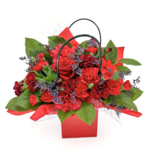 Kwiaty w czerwonej torebce